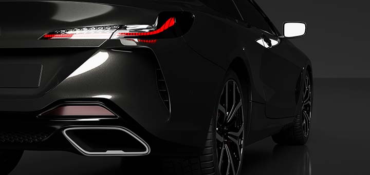 Rear detail shot of modern black premium car in studio light. Brandless modern style. 3D illustration
