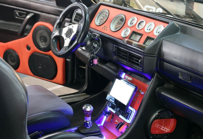 Can Your Car Sound Like a Concert? Crafting the Perfect In-Vehicle Audio Experience; custom car interior with audio system and lcd display