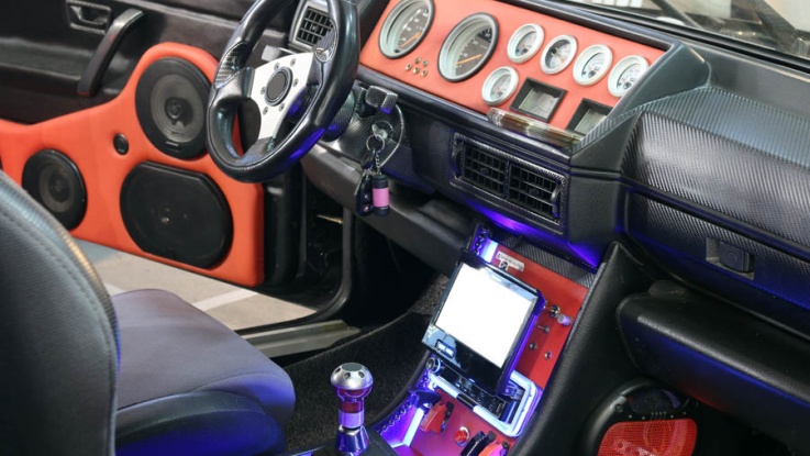 Can Your Car Sound Like a Concert? Crafting the Perfect In-Vehicle Audio Experience; custom car interior with audio system and lcd display