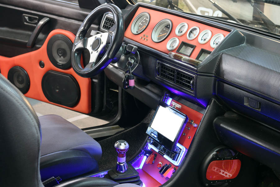 Can Your Car Sound Like a Concert? Crafting the Perfect In-Vehicle Audio Experience; custom car interior with audio system and lcd display