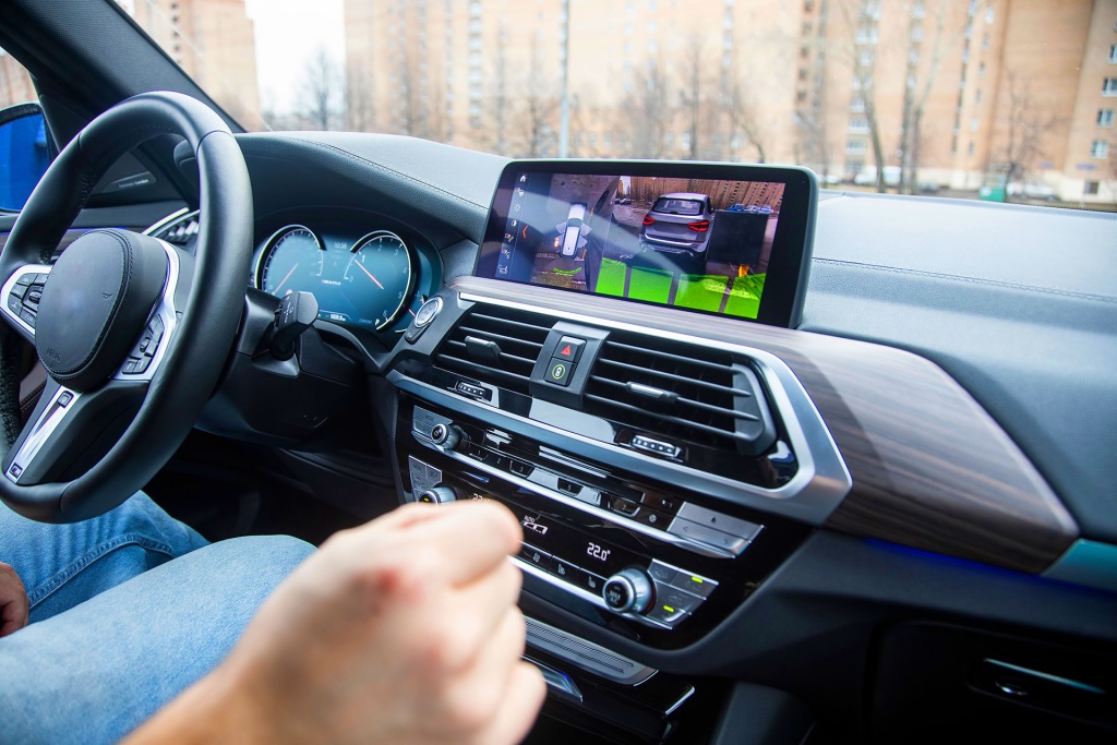 BMW interior dashboard with touchscreen camera display system