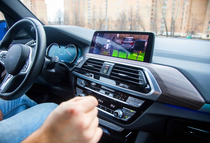 BMW interior dashboard with touchscreen camera display system