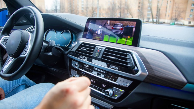 BMW interior dashboard with touchscreen camera display system