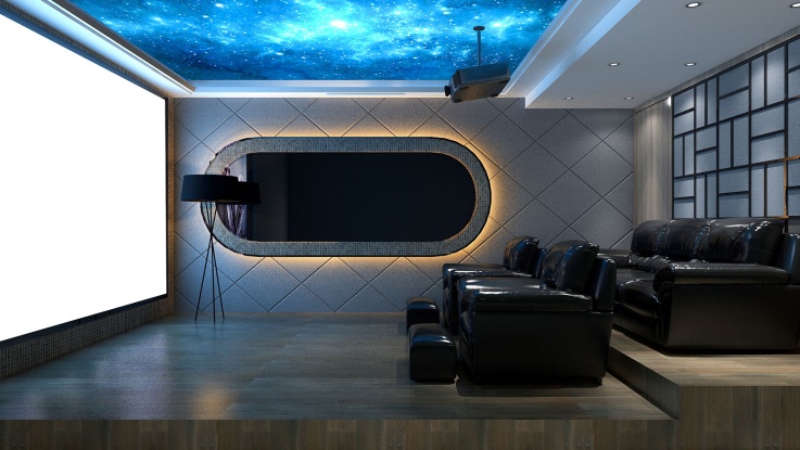 Home theater room with projector screen and stadium-style seating