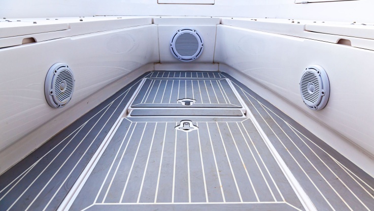 Marine boat deck with built in speakers and teak flooring